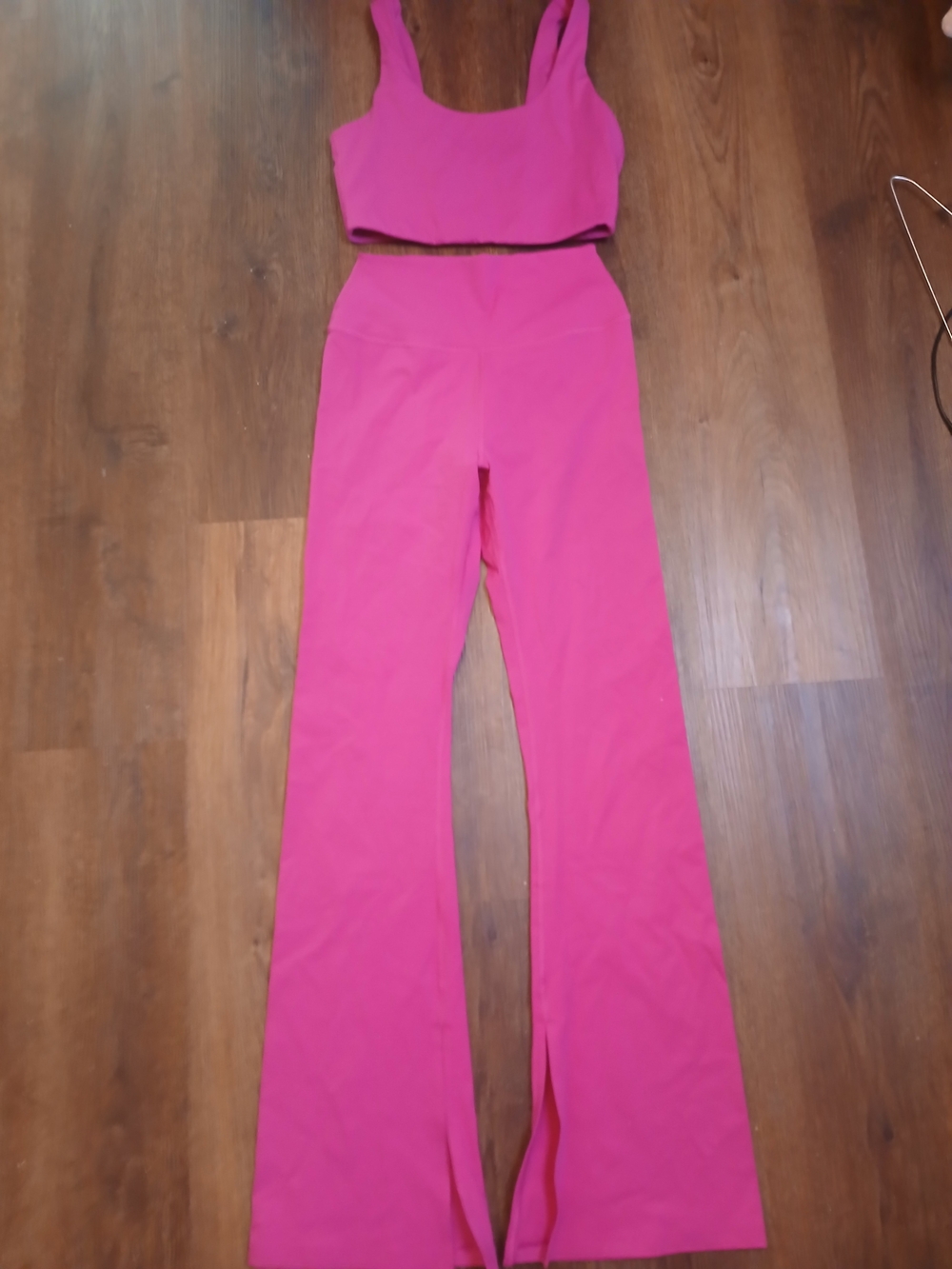Spiritual Gangster magenta athletic set featuring a matching sports bra and legg